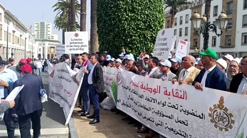 Hundreds of Islamic notaries protest in Rabat against proposed professional regu Stock Footage 333124345
