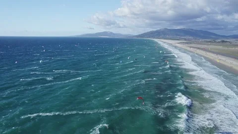 Hundreds of kiters ride in the ocean Stock Footage 231221528
