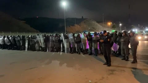 Hundreds of migrants clash with Moroccan troops at Ceuta border, Fnideq, MA - 16 Stock Footage 284779792