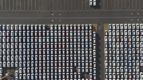 Hundreds of new vehicles in rows at Port of Veracruz terminal, aerial Stock Footage 345178737