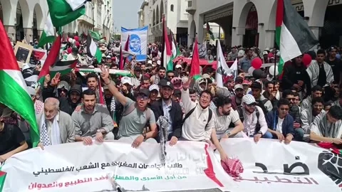 Hundreds of people protest in Rabat against Israel and to show their support for Stock Footage 333070118