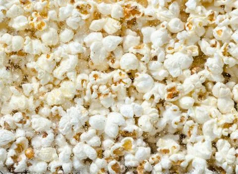 Hundreds popcorns background Stock Photos