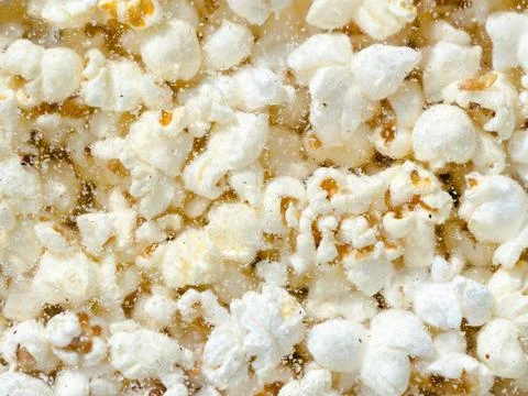 Hundreds popcorns background Stock Photos