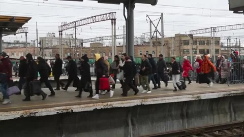 Hundreds of Ukrainians wait to board an evacuation train in Kyiv, Kyiv, UA - 05  Stock Footage 204106087