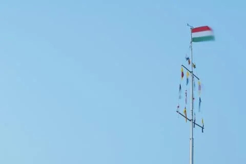 Hungarian Flag on Flagpole Stock Photos