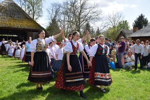Hungarian folk dance at Easter tradition festival with girls in costume Stock Photos
