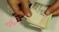 Hungarian Forint HUF, Counting Drugs and Money, Health Care, Colorful Pills HD Footage