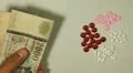 Hungarian Forint HUF, Counting Drugs and Money, Health Care, Colorful Pills HD Footage