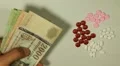 Hungarian Forint HUF, Counting Drugs and Money, Health Care, Colorful Pills HD Footage
