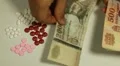 Hungarian Forint HUF, Counting Drugs and Money, Health Care, Colorful Pills HD Footage