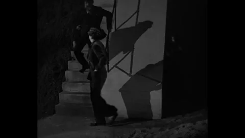 HUNGARY - 1930 - in this drama, when two thieves try to rob a man, things go Stock Footage 337958234