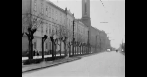 Hungary - circa 1970s: Authentic 8mm vintage footage of driving through a town Stock Footage 341395167