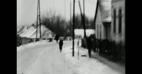 Hungary - circa 1970s: Authentic black and white home movie, snowy village Stock Footage 340142528