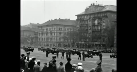 Hungary - circa 1970s: Spectators watching military parade in Communist-era Video stock 341396757