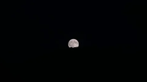 Hungary: Partial lunar eclipse visible over northern Hungary 動画素材 343830763