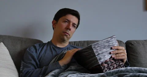 Hungover Man Sick on Couch 스톡 동영상 232784975