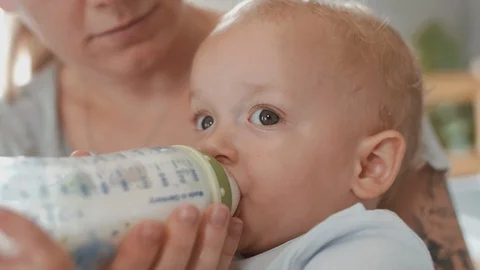 Hungry baby boy Stock Footage 104620556