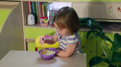 Hungry child eats. Stock Footage 68121680