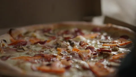 Hungry customer customer opens a cardboard box with pizza Customer received Stock Footage 236708507