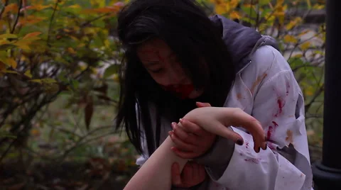 Hungry female vampire eating victim's dead body, monsters invasion, cannibalism Stock Footage 59083871