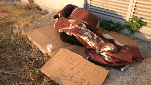 Hungry homeless sleeping Stock Footage 203848414
