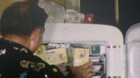 Hungry Man Attacks OPENS Refrigerator 1950s Vintage Film Food Home Movie 스톡 동영상 7032233