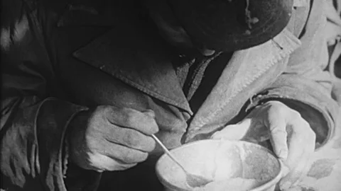 Hungry Man Eats Food Aid Relief Kitchen Refugee Shelter 1950s Vintage Film Movie 動画素材 76529813
