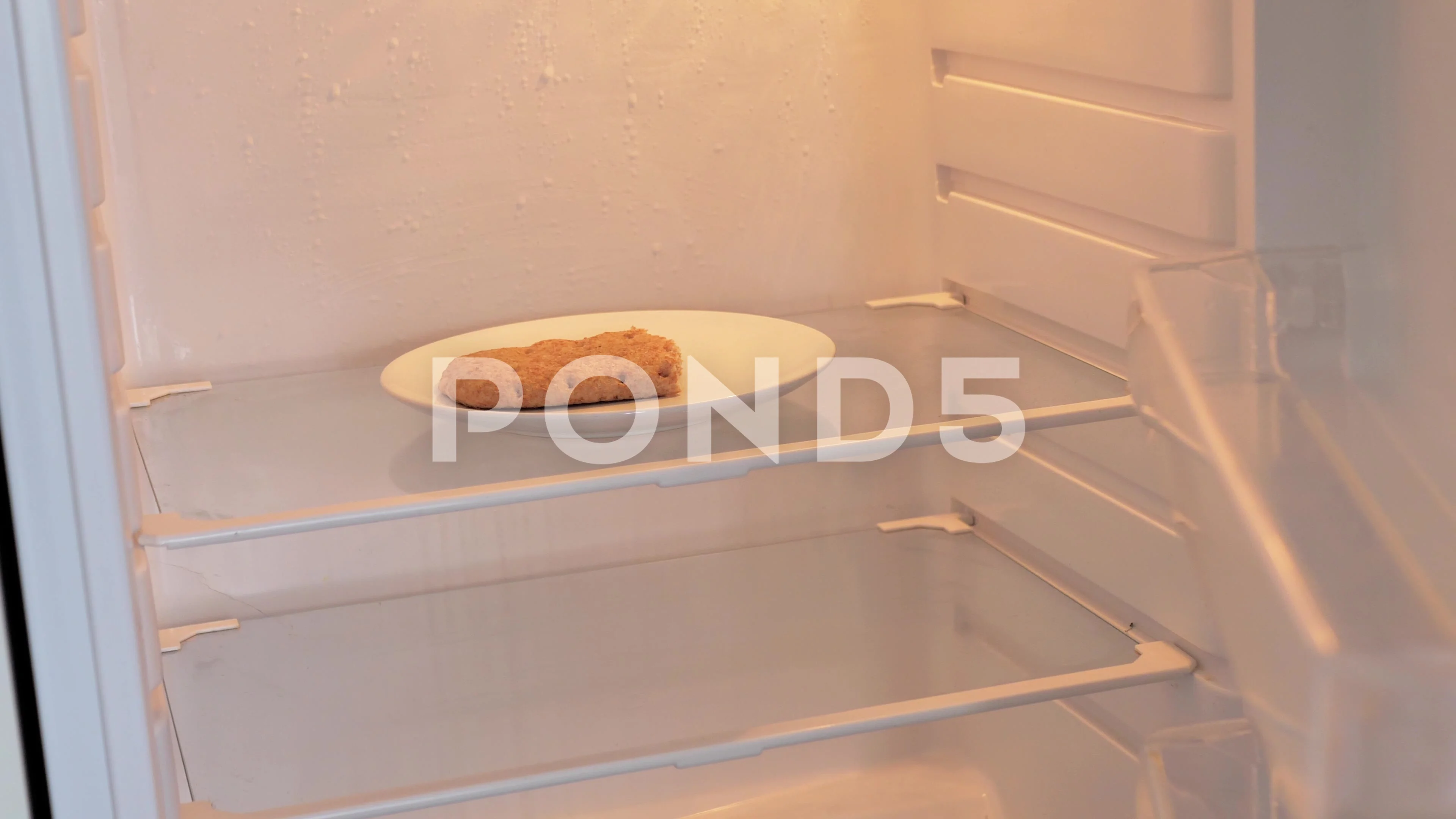 Hungry Man Opens the Empty Refrigerator and Takes the Leftover Bread.  Poverty, image size:3840x2160