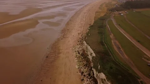 Hunstanton cliffs and beach aerial Stock Footage 121108453