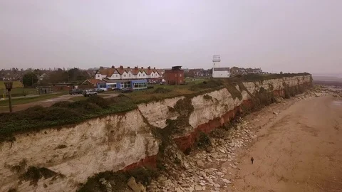 Hunstanton cliffs and lighthouse Stock Footage 121107313