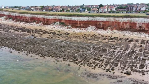 Hunstanton rock pools and cliff face Stock Footage 331812339