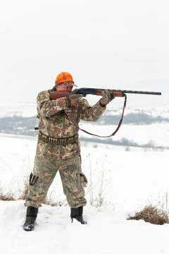 Hunter aiming Stock Photos