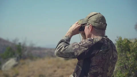 Hunter with binoculars closeup Vidéo 151808184