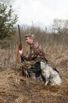 Hunter with a dog Stock Photos