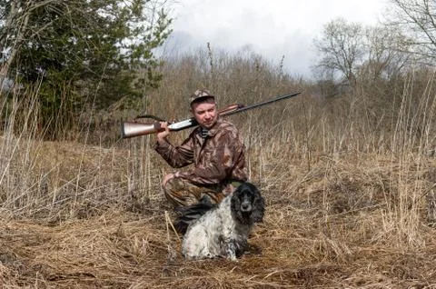 Hunter with a dog Stock Photos