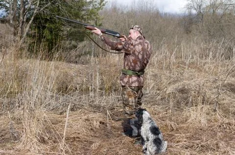 Hunter with a dog Stock Photos