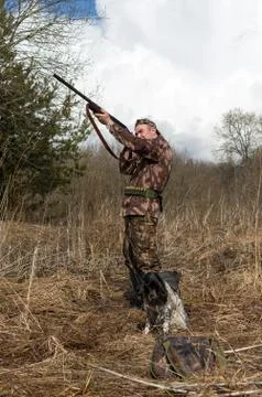 Hunter with a dog Stock Photos