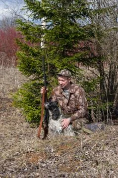 Hunter with a dog Stock Photos