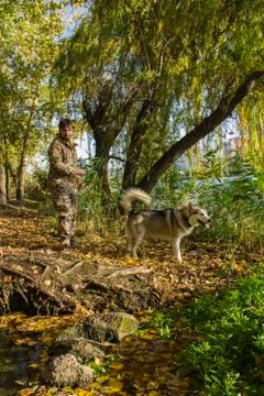 A hunter with a dog Stock Photos