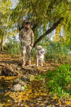 A hunter with a dog Stock Photos