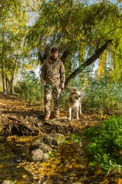 A hunter with a dog Stock Photos