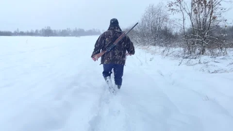 Hunter during hunting in forest. Hunter while hunting wild animals. Stock Footage 226949589