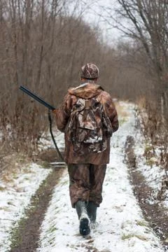 Hunter during winter hunt Stock Photos