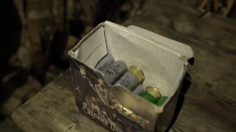 The Hunter is filing bullets in the fire shotguns for hunting Video stock 253214901