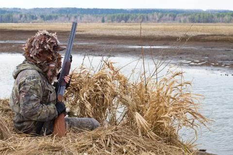 Hunter gets to the duck blind Stock Photos