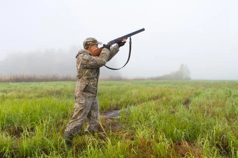 The hunter has the bird lined up Stock Photos