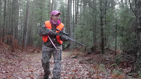 Hunter Hiking with Gun Preparing to Shoot 動画素材 172264732