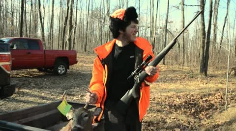 Hunter with his buck Видео 20495919