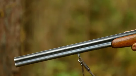 Hunter holding a shotgun. Stock Footage 30370343