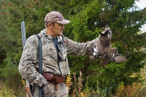 Hunter with hunting trophy Stock Photos